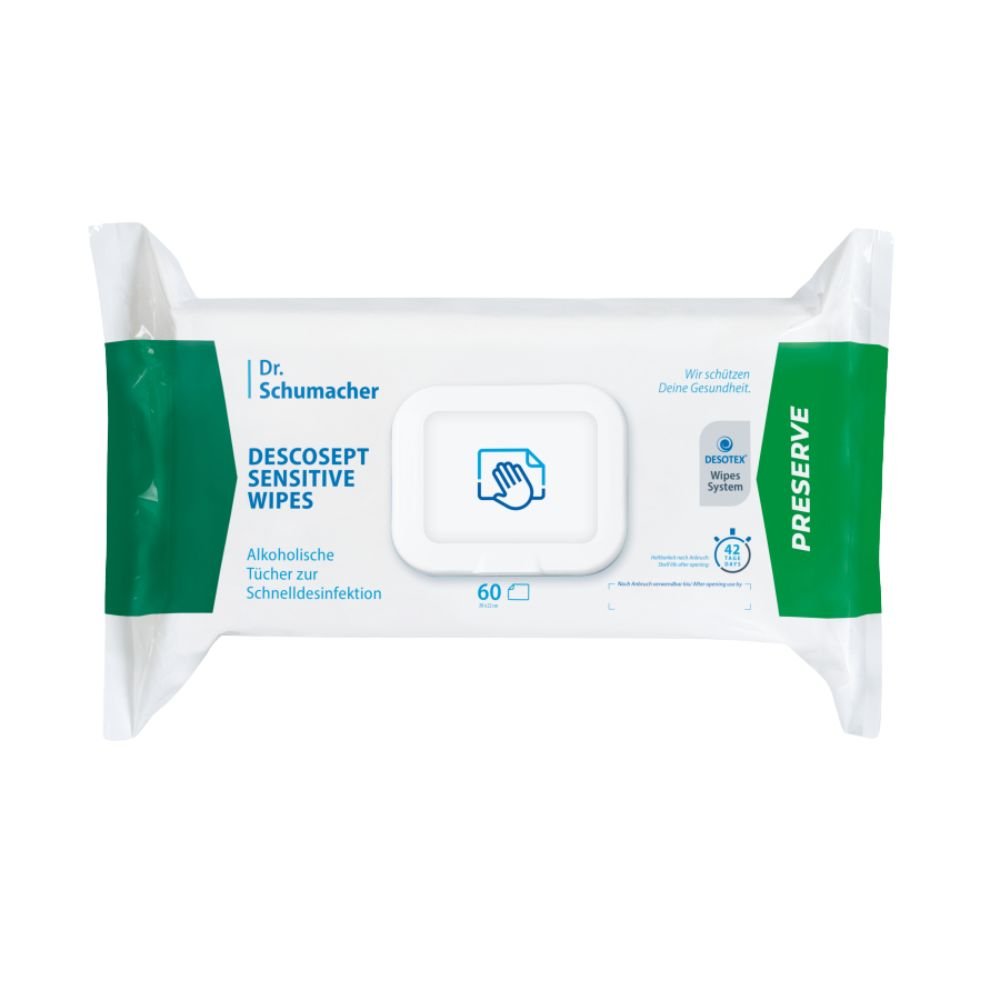Una confezione di salviettine disinfettanti Dr. Schumacher Descosept Sensitive Wipes della Dr. Schumacher GmbH per una rapida disinfezione. L’etichetta indica che si tratta di salviettine a base alcolica, ideali per superfici di medie dimensioni. La confezione è prevalentemente bianca con dettagli verdi e contiene 60 salviettine.