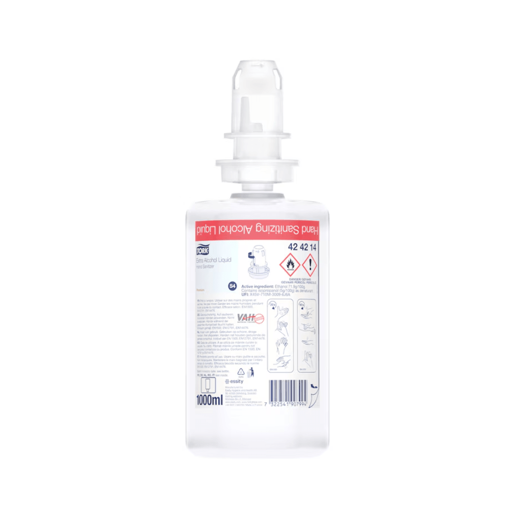 Una bottiglia in plastica trasparente da 1000 ml, modello Tork 424214, contenente il disinfettante extra per le mani TORK – Essity Professional Hygiene Germany GmbH, dotata di un erogatore a pressione. L’etichetta riporta simboli di sicurezza, istruzioni per l’uso corredate di illustrazioni e un testo multilingue relativo al mantenimento della funzione protettiva della pelle.