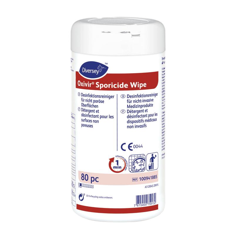 Un contenitore bianco di Oxivir Sporicide Wipe, salviette monouso preimbevute | Confezione (80 salviette) di Diversey Deutschland GmbH & Co. OHG ha un'etichettatura blu/rossa, informazioni multilingue e simboli per la disinfezione delle superfici e l'uso di dispositivi medici.
