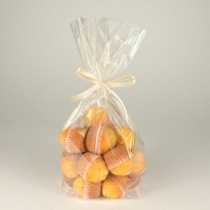 I sacchetti Starpak 10 in PP trasparente contengono piccoli muffin gialli in pirottini di carta marrone, sono chiusi con un nastro chiaro e disposti su uno sfondo semplice.