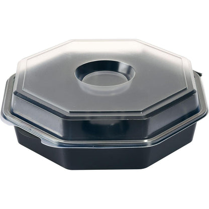 L'Octaview® con vetro Nero / Trasparente PS della Duni GmbH è un contenitore da asporto ottagonale nero con coperchio trasparente, che presenta una cavità rotonda al centro - ideale per una presentazione elegante dei cibi.
