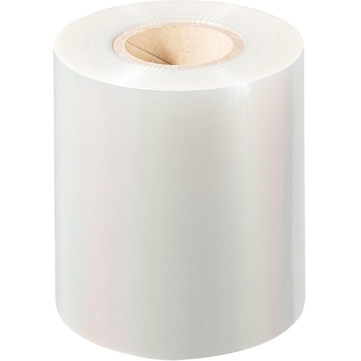 Un grande rotolo di pellicola sigillante PET Antifog PET della Duni GmbH è in piedi su uno sfondo bianco, con una pellicola lucida e avvolta strettamente su un nucleo di cartone per una pellicola sigillante antiappannante.