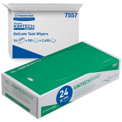 Sono raffigurati una scatola e un cartone aperto con salviette di precisione Kimtech® Science della Kimberly-Clark GmbH: la scatola verde contiene 100 salviette bianche a 2 strati, mentre il cartone più grande contiene 24 scatole con 100 salviette ciascuna (per un totale di 2.400 fogli).