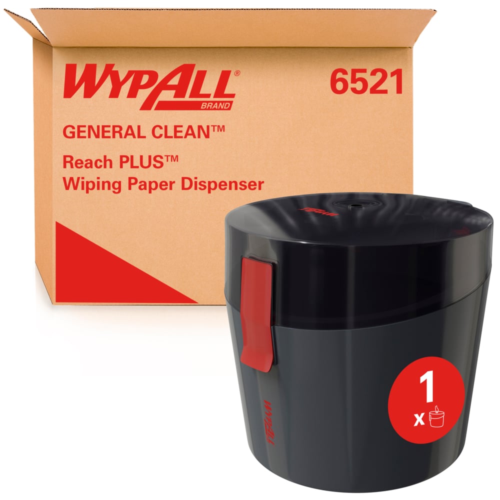 Un cartone con l'iscrizione "WypAll® Reach Plus™ Centrefeed Dispenser - 1 Dispenser | Karton (1 Dispenser)" della Kimberly-Clark GmbH si trova dietro un dispenser WypAll nero con chiusura rossa e indicazione "1 x" sulla parte anteriore.