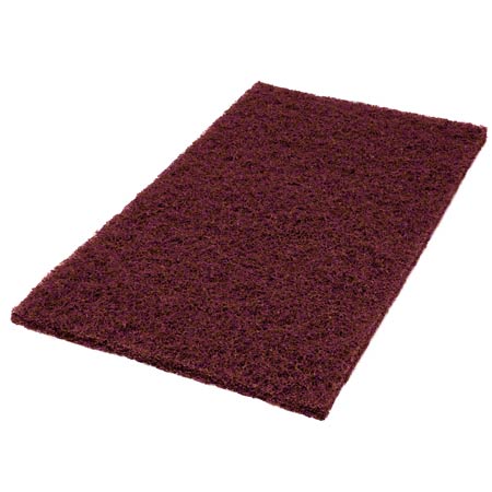 Il Twister Pad viola, rettangolare di Diversey Deutschland GmbH & Co. OHG è ideale per la pulizia di manutenzione di pavimenti duri rivestiti e ha una superficie strutturata color castagno. Qui raffigurato su sfondo bianco.