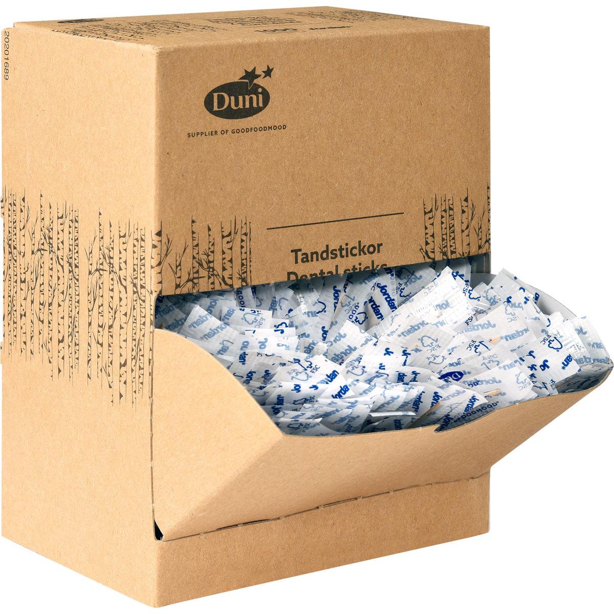 Una scatola marrone di cartone con la scritta "Duni GmbH Zahnstocher Neutral Holz 50 | Packung (1000 Stück)" contiene stuzzicadenti di legno confezionati singolarmente in confezioni bianche e blu, alcuni dei quali sono visibili attraverso la parte frontale aperta.
