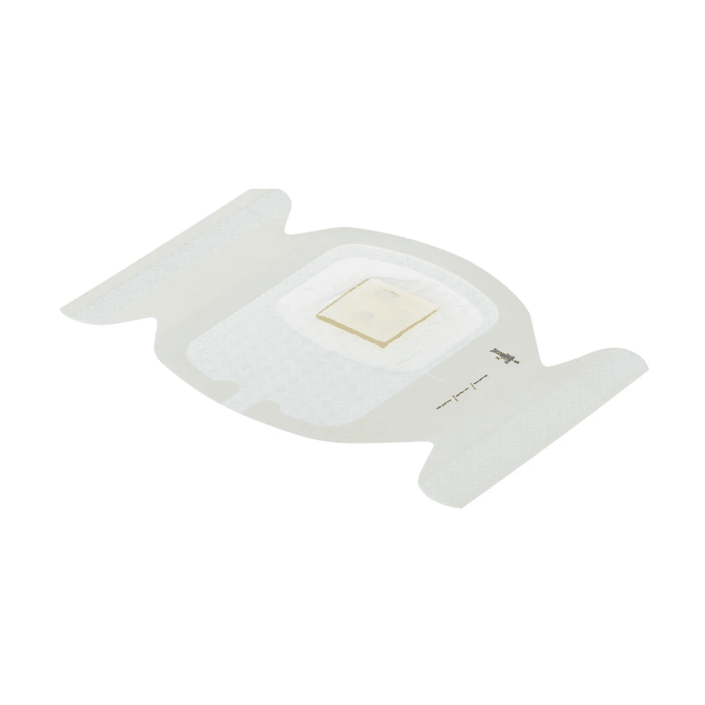 Il 3M Tegaderm CHG Clorexidina Gluconato I.V. Medicazione Fissativa (7 x 8,5 cm) di Solventum Germany GmbH è una medicazione antimicrobica trasparente con un pad centrale bianco e sensore su uno sfondo semplice bianco, progettato per contribuire alla riduzione delle infezioni da catetere.
