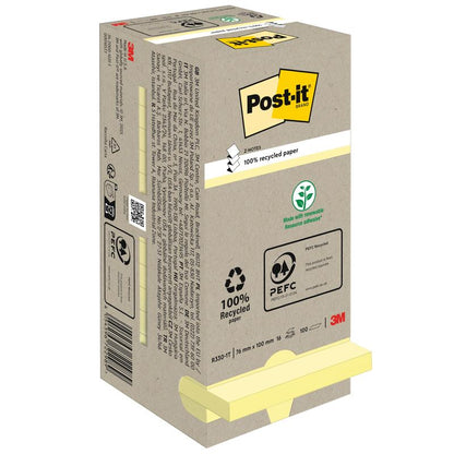 L'immagine mostra una scatola della 3M Deutschland GmbH Post-it® Recycling Z-Notes (76x76mm, 100 fogli, 100% PEFC) con simboli ecologici sulla confezione e due blocchi gialli parzialmente visibili sul fondo.