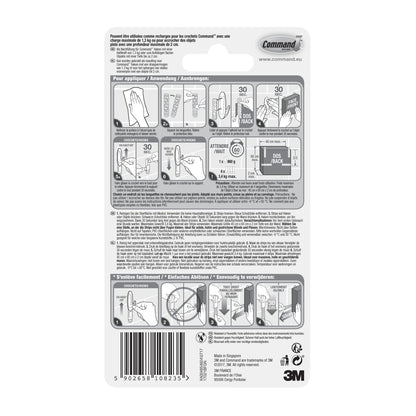 I Command™ Strips 17021B, impermeabili (taglia M, 10/confezione) di 3M Deutschland GmbH dispongono di istruzioni per l'uso illustrate, avvertenze di sicurezza, testo multilingue, codice a barre e logo 3M - ideali per il fissaggio senza fori in bagno.