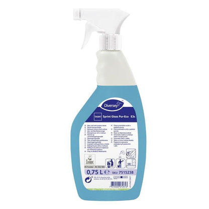 Una bottiglia spray bianco-blu con la scritta "TASKI Sprint Glass Pur-Eco detergente per vetri e superfici" della Diversey Deutschland GmbH & Co. OHG contiene 0,75 litri di detergente ecologico, con istruzioni d'uso sull'etichetta posteriore.