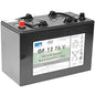 Un blocco di trazione a batteria nero 12V/76Ah a gel di Diversey Deutschland GmbH & Co. OHG, esente da manutenzione con morsetti rossi/neri e simboli di sicurezza/riciclaggio su etichetta bianca. Tensione di esercizio: 12V, Capacità: 76Ah. Confezione (1 pezzo).