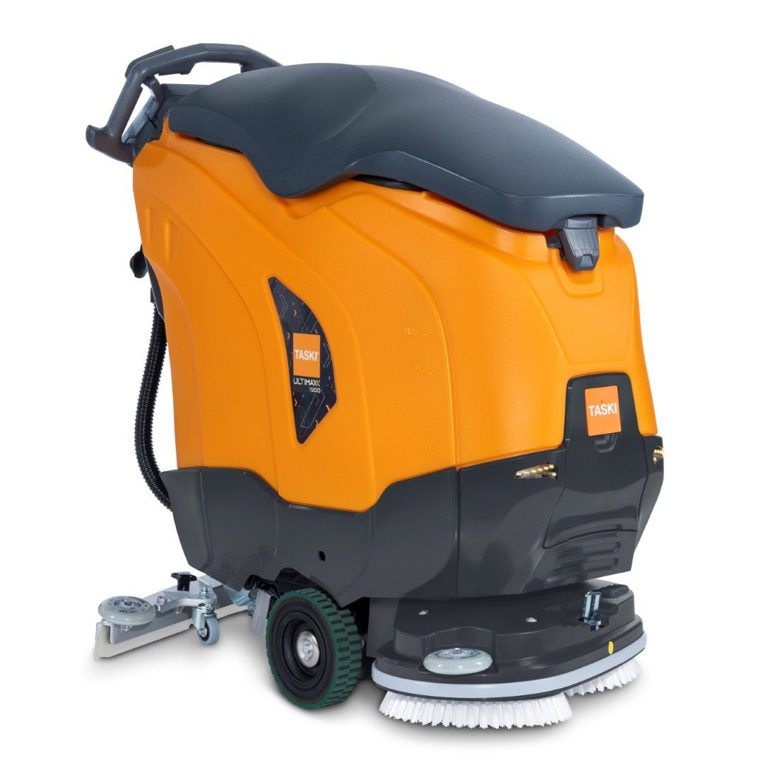 La TASKI ULTIMAXX 1900 DD65 Performance BMS 13A EBU di Diversey: Lavapavimenti di nuova generazione con trazione a ruote, serbatoio da 42L, doppio disco da 65cm e maniglia di controllo - perfetta per una pulizia industriale efficiente.