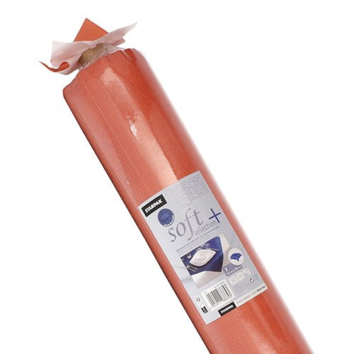 Un rotolo di tovaglia Starpak, simile al tessuto in tessuto non tessuto "soft selection plus" carta medica con un'etichetta centrale con il marchio Starpak, istruzioni per l'uso e l'immagine di un tavolo da esame coperto di carta, che evidenzia la qualità della tovaglia durevole.