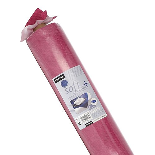 Un rotolo di tovaglia Starpak, simile al tessuto, in tessuto non tessuto "soft selection plus" panni rosa per la pulizia in una confezione di plastica con un'etichetta con informazioni sul prodotto e un'immagine della tovaglia in uso.