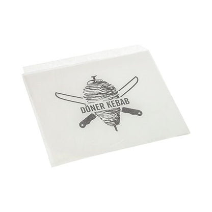 Le buste per kebab Döner PAPSTAR, sostituto del pergamena, 16x16 cm, pellicola termoretraibile a prova di grasso (1000 pezzi) della PAPSTAR GmbH è un imballaggio alimentare bianco e resistente con uno spiedo Döner e coltelli incrociati, oltre al testo "DÖNER KEBAB".
