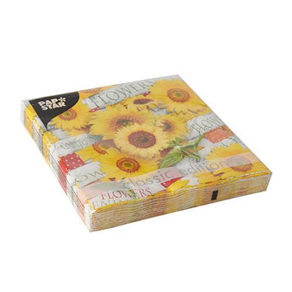 Una confezione di PAPSTAR 20 tovaglioli, 33 cm x 33 cm, 3 strati, Design Set 1 presenta un motivo di girasoli con "Classic Edition" e "Flowers" sulla confezione. Il marchio PAPSTAR GmbH è raffigurato in alto a sinistra.