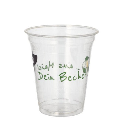 Un trasparente PAPSTAR 50 bicchieri PLA "Bicchiere di mais" della PAPSTAR GmbH con la scritta verde "Il tuo bicchiere" sul lato è vuoto e visibile su uno sfondo bianco semplice.