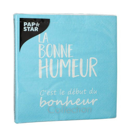 Una confezione blu di PAPSTAR 20 tovaglioli, 33x33 cm, 3 strati, con "La bonne humeur c'est le début du bonheur Collection" in bianco e il logo della PAPSTAR GmbH in alto a sinistra.