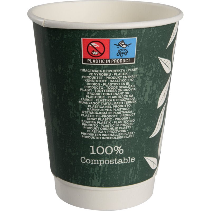 La tazza da caffè a doppia parete Bio "Green Leaves" di Abena Re-Seller GmbH è una tazza verde scuro con motivi di foglie bianche, etichetta "100% compostabile" e adesivo multilingue "Plastica nel prodotto" con simboli di materiali ecologici.