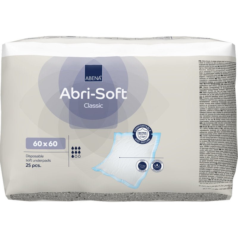 Una confezione da 25 teli monouso Abena Re-Seller GmbH Abri-Soft Classic, 60x60 cm, Blu. La confezione mostra i dettagli del prodotto, un'immagine del telo e simboli di certificazione.