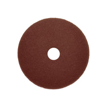 Un Arcora Sunshine Strong Plus No1+ Pad rotondo, marrone scuro di Arcora International GmbH con superficie strutturata e foro, fotografato su sfondo bianco. Disponibile in scatola (10 pezzi).