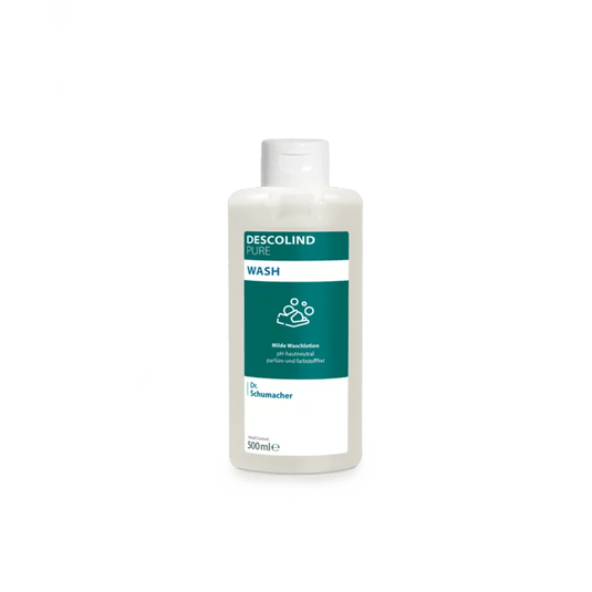 Una bottiglia di plastica bianca contenente la lozione detergente Dr. Schumacher Descolind Pure Wash (500 ml) della Dr. Schumacher GmbH, con un’etichetta verde e bianca, è raffigurata su uno sfondo semplice di colore grigio chiaro. Questa lozione detergente, a pH neutro per la pelle e senza profumo, è ideale per la pelle sensibile.
