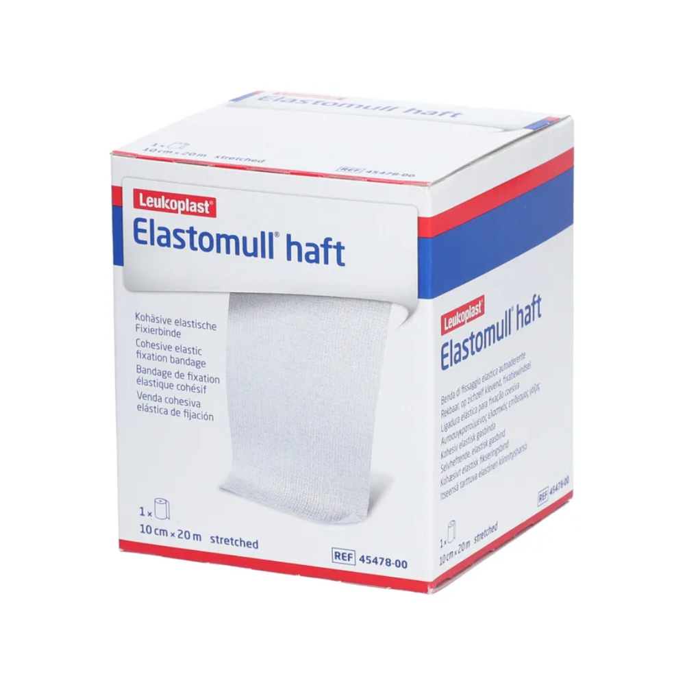 Una scatola di BSN Elastomull® haft, una benda elastica di fissaggio della BSN Medical GmbH. La scatola è prevalentemente bianca con accenti blu e rossi e mostra sul fronte dettagli e specifiche del prodotto.