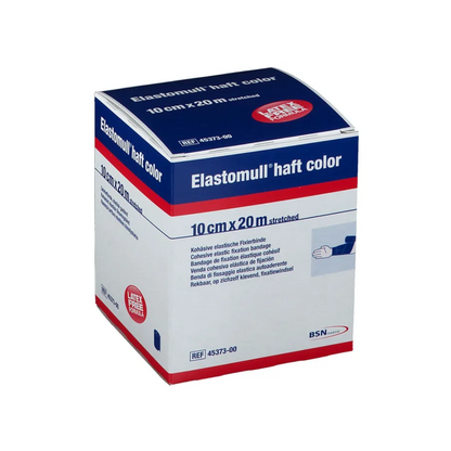 In esposizione c'è una scatola di colori BSN Elastomull® haft della BSN Medical GmbH, prevalentemente in blu e bianco con accenti rossi. Le dimensioni "10 cm x 20 m esteso" sono chiaramente visibili. Questo prodotto polimerico senza lattice è descritto come una benda di fissaggio elastica e coesiva.