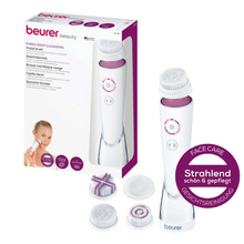 L'immagine mostra un set di spazzole per il viso FC 95 Pureo Deep Cleansing di Beurer GmbH confezionato. Il set comprende il dispositivo principale per la spazzola per il viso, tre testine diverse adatte a ogni tipo di pelle e un piccolo scudo rotondo viola che evidenzia l'effetto di pulizia profonda della cura e pulizia del viso.