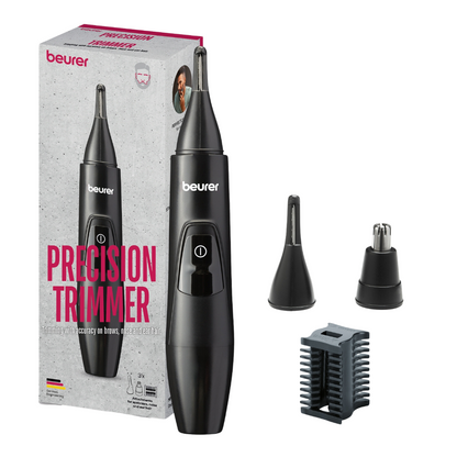 Immagine di un Beurer MN2X regolabarba di precisione nero di Beurer GmbH, posizionato verticalmente davanti alla sua confezione. Il regolabarba è dotato di un pulsante di accensione e viene fornito con tre testine rimovibili e una piccola spazzola di pulizia grigia. Sulla confezione sono evidenziate le funzioni per la rifinitura delle sopracciglia, dei peli del naso e delle orecchie.