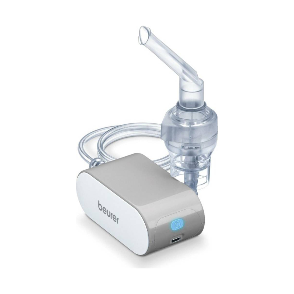 L'articolo fuori produzione: Beurer piccolo inalatore IH 58 della Beurer GmbH è un nebulizzatore portatile con maschera trasparente, tubo, base compatta bianco-grigia e stazione di ricarica USB - perfetto per la gestione dell'asma o delle malattie respiratorie.