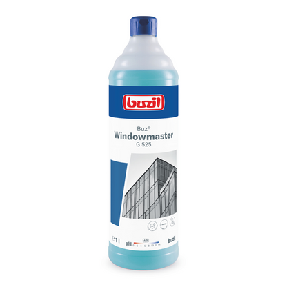 Una bottiglia di Buzil Buz® Windowmaster G 525 concentrato per la pulizia di vetri e finestre di BUZIL-WERK Wagner GmbH & Co. KG con tappo blu ed etichetta con l'immagine di un edificio con finestre in vetro. La bottiglia promette una pulizia senza aloni ed è caratterizzata da un volume di 1 litro e informazioni sul pH per prestazioni ottimali.