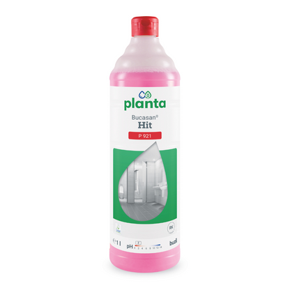 Una bottiglia rosa di Buzil Planta Bucasan® Hit P 921, un detergente ecologico per la manutenzione sanitaria di BUZIL-WERK Wagner GmbH & Co. KG, mostra sull'etichetta un bagno per evidenziare la sua efficacia come anticalcare per una brillantezza senza strisce. La bottiglia da 1 litro è dotata di un tappo rosso.