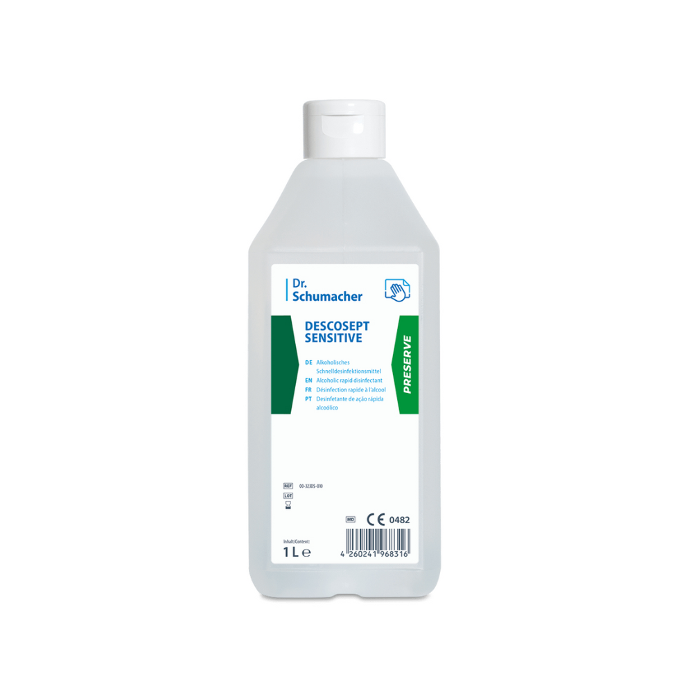 Una bottiglia da 1 litro di Dr. Schumacher Descosept Sensitive Disinfezione Rapida per la disinfezione di dispositivi medici. La bottiglia bianca con il marchio Dr. Schumacher GmbH è dotata di un tappo a scatto bianco e di una scritta verde-blu e diverse righe di testo. L'etichetta contiene informazioni sul prodotto e un codice a barre sulla parte inferiore.