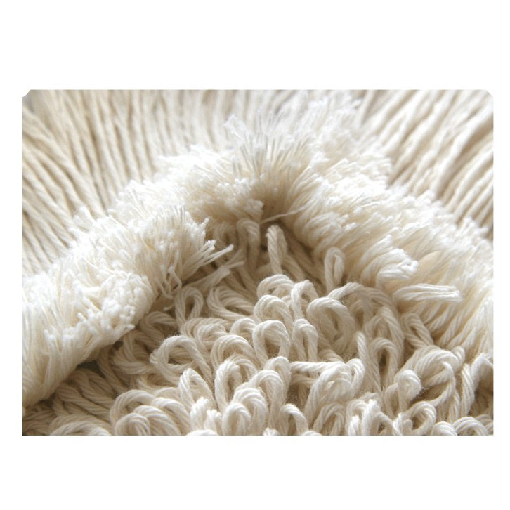 Un primo piano dell'Arcora First Mopp Blu di Arcora International GmbH mostra le sue fibre blu strutturate - ideale per migliorare i tuoi pavimenti e facile da mantenere con la pulizia regolare.