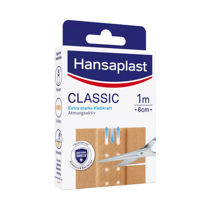 Una scatola di cerotti Hansaplast Classic – varie dimensioni, raffigurata con un rotolo di cerotto adesivo traspirante lungo 1 metro e largo 6 cm con maggiore forza adesiva e proprietà traspiranti della Beiersdorf AG.