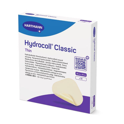 Una confezione di bendaggi sterili Hartmann Hydrocoll® Classic Thin, sigillati singolarmente dalla Paul Hartmann AG, contiene 10 pezzi (10 cm x 10 cm) con il logo del marchio e una parte dell'immagine di una benda beige per il trattamento umido delle ferite.