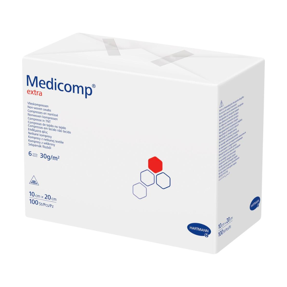 Una scatola di compresse di garza non sterili Hartmann Medicomp® extra - 100 pezzi della Paul Hartmann AG, con testo e loghi prevalentemente in blu e rosso su sfondo bianco. Sulla scatola sono indicate dimensioni e quantità.