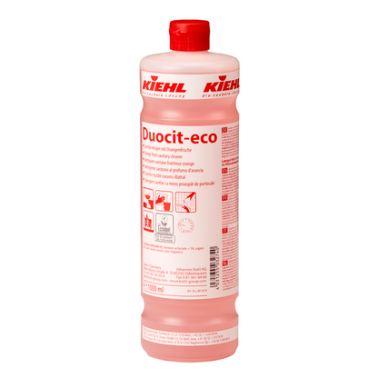 La bottiglia da 1 litro del detergente sanitario Kiehl Duocit-eco con freschezza d'arancia della Johannes Kiehl KG ha un tappo rosso e un'etichetta con informazioni multilingue. La bottiglia contiene liquido rosa per una pulizia ecologica e lascia un fresco profumo di arancia.