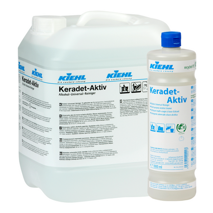Zwei Gebinde Kiehl Keradet-Aktiv Alkohol-Universal-Reiniger der Johannes Kiehl KG: ein 10L-Kanister und eine 1L-Flasche, beide mit blau/schwarzer Schrift auf weißen Etiketten. Ideal für die Reinigung aller Oberflächen.
