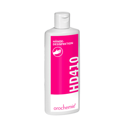 La bottiglia di plastica bianca con l'etichetta rosa "Orochemie HD 410 Disinfezione delle mani" della orochemie GmbH + Co KG, un preparato alcolico per la disinfezione delle mani, è dotata di un pratico tappo a scatto.