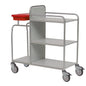 Il carrello stazionario Novocal durevole in acciaio inossidabile con tre ripiani, quattro ruote e contenitore in plastica rossa in alto a sinistra è vuoto e raffigurato su sfondo bianco. Tutte le connessioni dei tubi sono saldate tutto intorno.