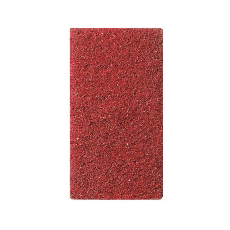Un rettangolare pad manuale rosso TASKI Twister Utility TXP di Diversey Deutschland GmbH & Co. OHG, con superficie strutturata, fotografato su uno sfondo bianco uniforme. Per la pulizia manuale di aree difficili da raggiungere o da utilizzare con detergenti per bordi.