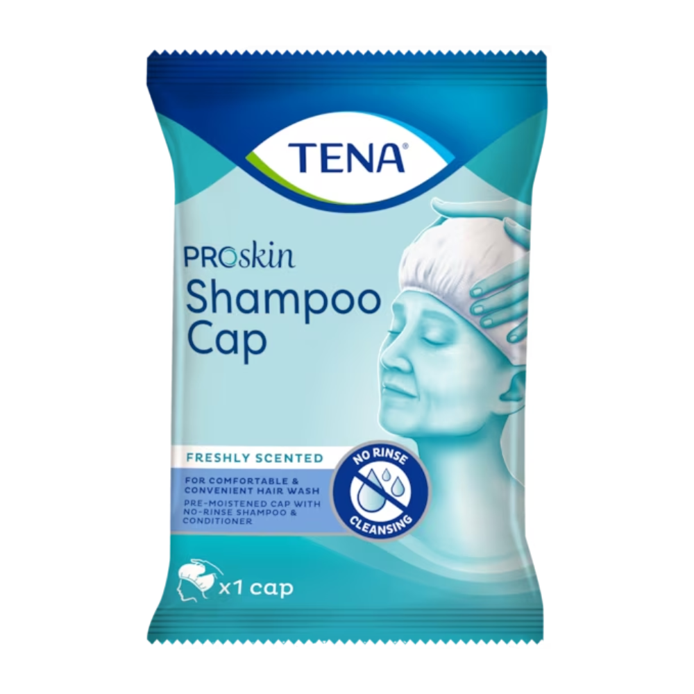 La cuffia lavante TENA ProSkin Shampoo Cap di TENA - Essity Germany GmbH è presentata in una confezione dal design blu-bianco, su cui è raffigurata una persona che utilizza questo cappuccio monouso. Il testo sottolinea "Fresca profumazione", "Pulizia senza risciacquo" e comprende sia "Shampoo che balsamo". Contiene una cuffia.