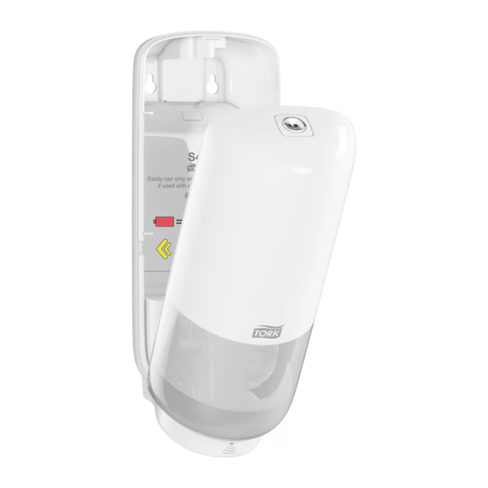 Der wandmontierte Tork 561600 Hautpflege Spender mit Intuition Sensor Elevation S4 von TORK - Essity Professional Hygiene Germany GmbH verfügt über eine offene Frontabdeckung in Weiß. Der transparente untere Teil ermöglicht den Blick auf den Seifenbehälter, während im offenen Inneren Installations- und Nachfüllanweisungen sowie Pfeile angezeigt werden, was eine einfache Wartung der berührungslosen Spenderfunktion gewährleistet.