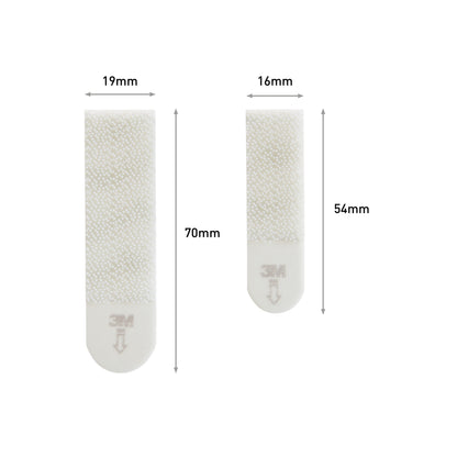 Zwei Command™ Bilder-Montage Strips (klein: 16 x 54 mm, mittel: 19 x 70 mm) von 3M Deutschland GmbH im Vorteilspack 17203-ideal zum Bilderaufhängen ohne Bohren oder Nägel.