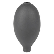 Der Pressure Man II Druckball, schwarz (1 Stück), ist ein ovaler schwarzer Gummikolben mit einem schmalen Hals und einer kleinen oberen Öffnung, der üblicherweise in medizinischen oder Laborgeräten verwendet wird.