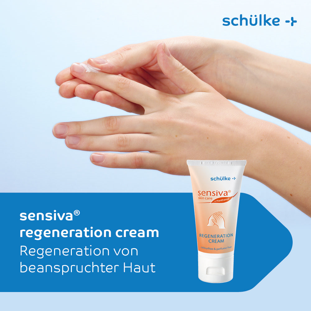 Eine Person trägt Creme aus einer Tube mit der Aufschrift „Schülke Sensiva® Regenerationscreme - 50 ml“ von Schülke & Mayr GmbH auf, die für ihre dermatologisch getestete Formel bekannt ist. Der deutsche Text „Regeneration von beanspruchter Haut“ steht auf blauem Hintergrund.
